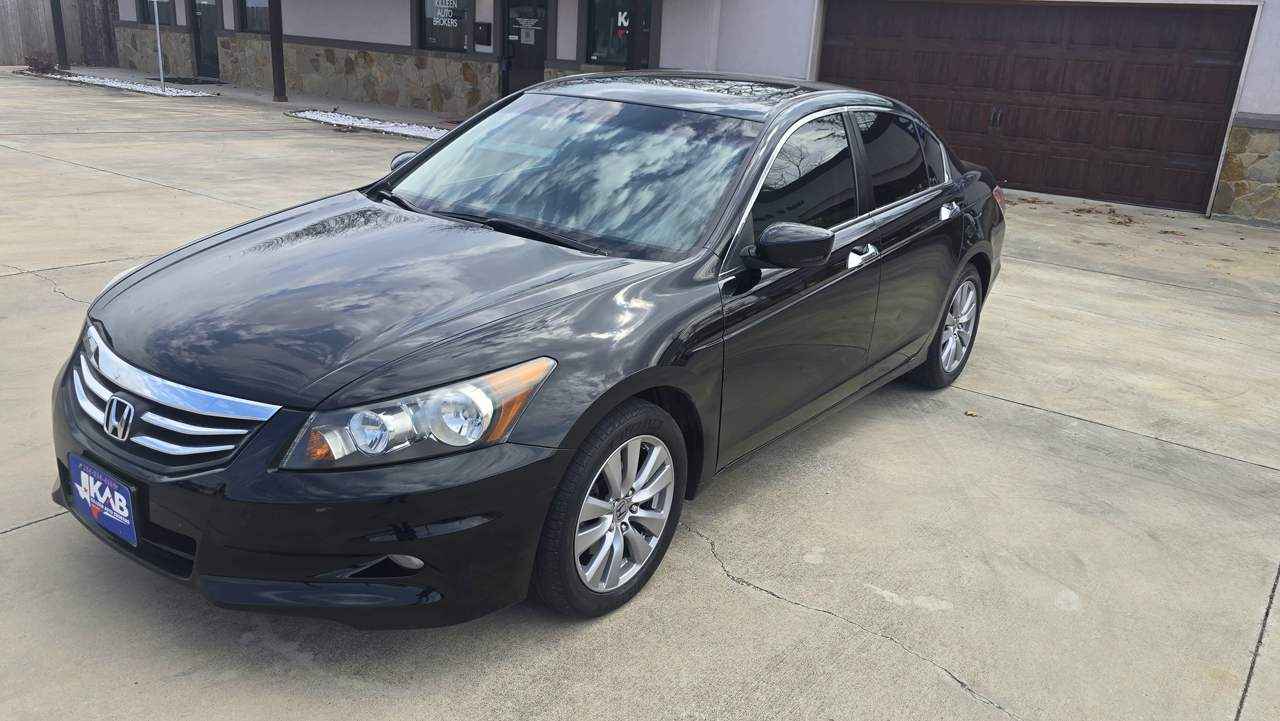 2012 Honda Accord EX-L V6 Luxury Sedan in White featuring a 3.5L V6 engine and a pristine one-owner history at BuskoCars.