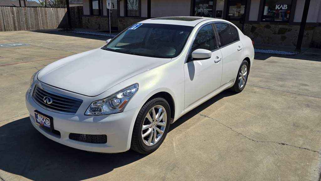 2009 Infiniti G37 Base Sedan in silver, featuring a 3.7L V6 engine and a verified clean title.