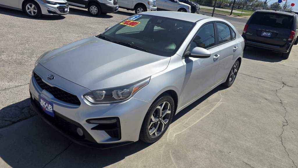 2019 Kia Forte S in Silver featuring sport-tuned suspension and machine-finished 17-inch wheels at BuskoCars.