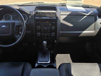 Interior Cabin: Luxury Limited trim featuring leather-appointed seating and Ford SYNC connectivity.