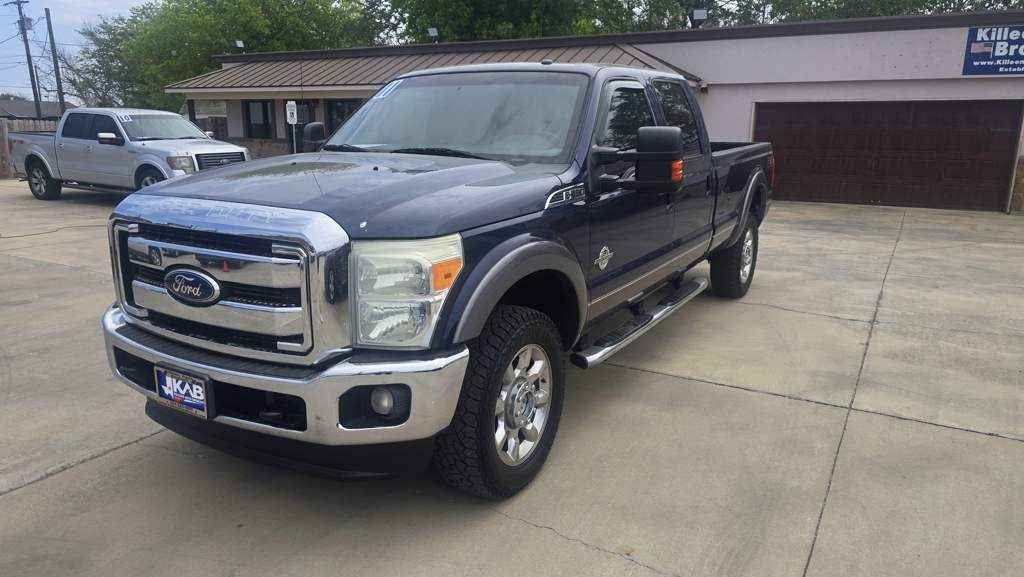 2011 Ford F-350 Super Duty Crew Cab featuring a 6.7L V8 CRDI Biodiesel engine and a verified clean title.