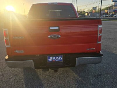 Rear Profile: Full-size pickup stance with a minor left rear impact reported in 2015, professionally maintained since.