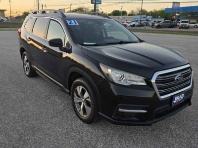 Side profile showcasing the roof rails and aerodynamic lines.