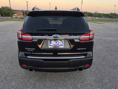 Rear perspective emphasizing the symmetrical dual exhaust and AWD badging.