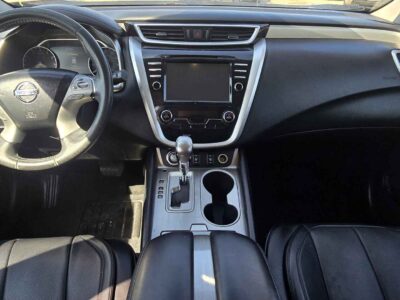 Interior cockpit view featuring the premium infotainment suite and refined dashboard finishes