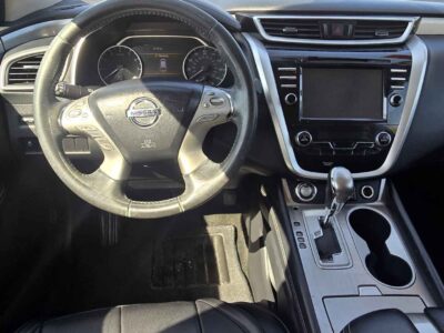 Interior cockpit view featuring the premium infotainment suite and refined dashboard finishes