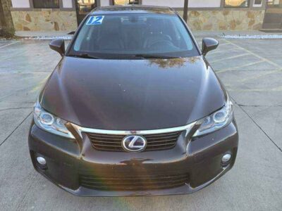 Front Profile: 2012 Lexus CT 200h showcasing the sophisticated compact luxury hatchback stance and signature spindle-style grille.