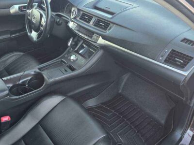 Interior Cabin: Luxury-appointed compact cabin featuring executive aesthetics and hybrid-system interface.