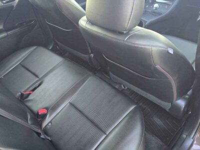Interior Cabin: Luxury-appointed compact cabin featuring executive aesthetics and hybrid-system interface.