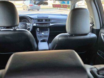 Interior Cabin: Luxury-appointed compact cabin featuring executive aesthetics and hybrid-system interface.