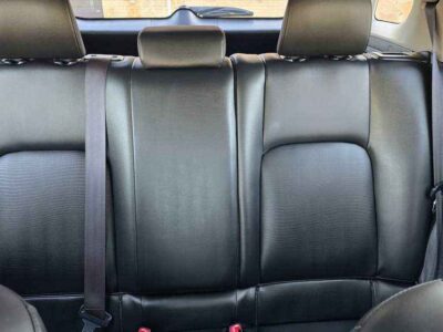 Interior Cabin: Luxury-appointed compact cabin featuring executive aesthetics and hybrid-system interface.