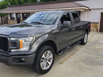 2018 Ford F-150 Lariat in Shadow Black - Orion Elite Certified Luxury Pickup.