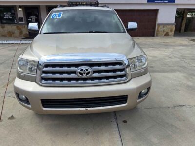 Front Profile: 2008 Toyota Sequoia Limited showcasing the robust front grille and signature Large-SUV stance.