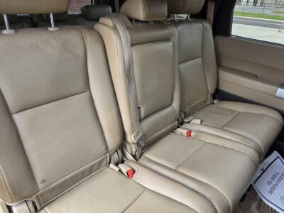 Interior Cabin: Limited trim interior featuring three-row capacity and premium comfort configurations typical of the Large-SUV class