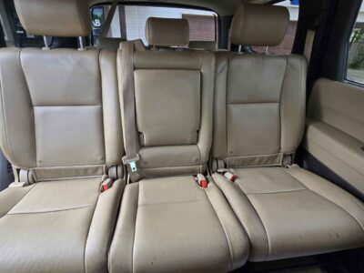 Interior Cabin: Limited trim interior featuring three-row capacity and premium comfort configurations typical of the Large-SUV class