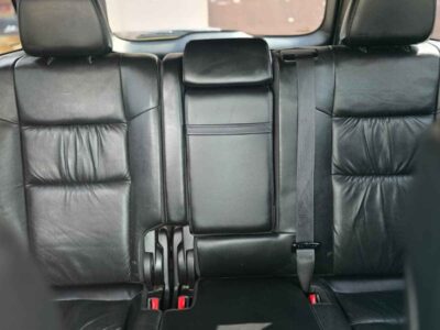 Interior Cabin: Premium Limited trim interior with Black/Light Frost Beige accents, heated leather seating, and Uconnect interface.