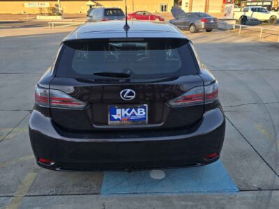 Rear Profile: Contemporary sedan profile highlighting the refined rear fascia and efficient compact footprint.