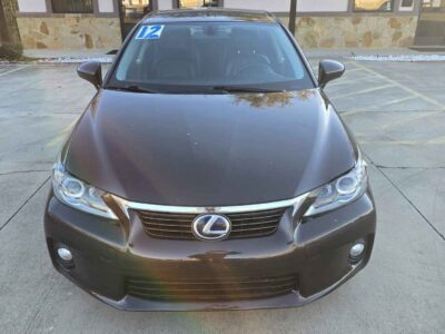 Front Profile: 2020 Nissan Sentra SV showcasing the signature V-Motion grille and sleek Electric Blue Metallic finish.