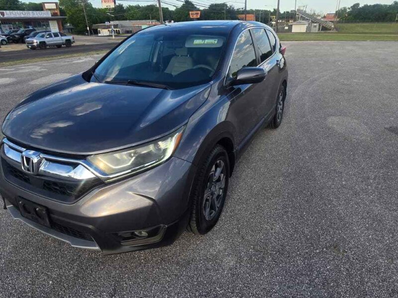 Used 2017 Honda CR-V EX compact crossover SUV in Modern Steel Metallic front view at BuskoCars