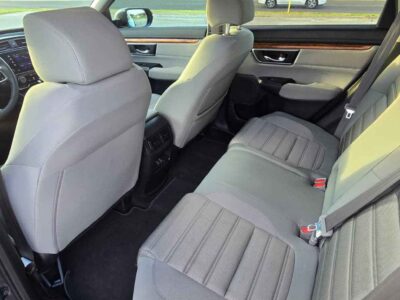 Spacious interior passenger cabin space showcasing premium EX fabric bucket seats and split fold rear bench inside 2017 Honda CR-V
