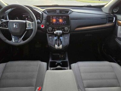 2017 Honda CR-V EX dashboard console view highlighting multi-function steering wheel lane assist switches and infotainment control center