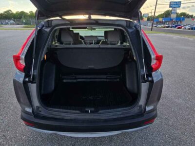 Rear fascia layout of 2017 Honda CR-V EX showing upper roof spoiler tint glass and integrated backup parking safety camera