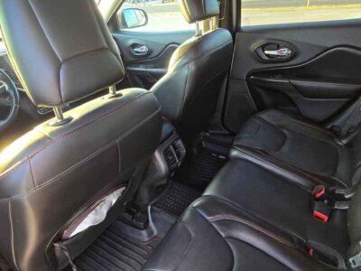 Premium Black Leather Interior Group cabin layout showcasing full panoramic dual-pane sunroof and power bucket seats inside 2015 Jeep Cherokee Trailhawk