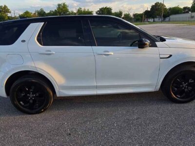 2022 Land Rover Discovery Sport S R-Dynamic side profile accentuating premium Ostuni Pearl White exterior