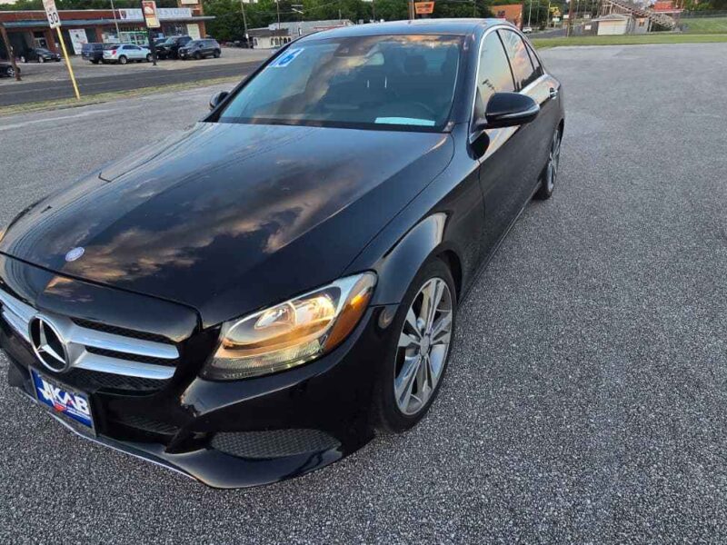 Used 2016 Mercedes-Benz C 300 4MATIC luxury sedan in Black front exterior view at BuskoCars